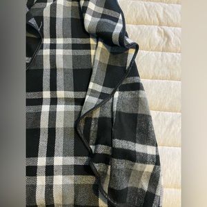 Medium black, gray, and white waterfall vest